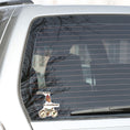 Load image into Gallery viewer, Give your heart a workout! This steampunk sticker has a steampunk anatomic heart and a steampunk bicycle. This image shows the steampunk workout sticker on the rear window of a car.