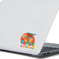 Load image into Gallery viewer, Who doesn't want to chill with their gnomies in the summer? This individual die-cut sticker features three gnome friends who are ready for the beach. They're standing in front of a setting sun silhouetting palm trees. Enjoy! This image shows the Summer with my Gnomies sticker on the back of an open laptop.