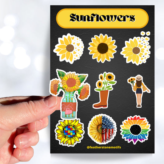 Love sunflowers? Then show it with this sticker sheet! This sticker sheet has nine larger sunflower images. This image shows a hand holding a sticker with three sunflowers in a glass jar vase above the sticker sheet.