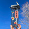 Load image into Gallery viewer, This sticker sheet is great for educators to give to students, or for students to give as a gift to their teacher/educator! The sticker sheet is filled with sticker images like books, and inspirational sayings like "Keep Going", "Never Stop Reading", and "School is Cool". This image shows a water bottle with the sheet header reading "Teacher", a turtle holding books, a rainbow, and owls reading, applied to it.