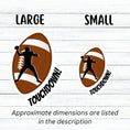 Load image into Gallery viewer, This individual die-cut sticker features the silhouette of a football (American) player about to pass the ball, on a football background, with the word "Touchdown!" on the lower right side. This image shows the large and small touchdown stickers next to each other.