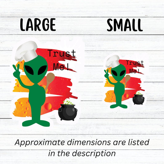 I wouldn't trust this space alien! This individual die-cut sticker features a green space alien flashing a peace sign, but wearing a chefs hat and trying to hide a wooden spoon, with a boiling pot behind, all on an orange background with the words "Trust Me!" in the upper right corner. This image shows the large and small trust me alien stickers next to each other.