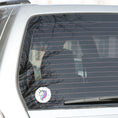 Load image into Gallery viewer, This individual die-cut sticker features a teal and purple unicorn with stars in the background. This image shows the teal and purple Unicorn sticker on the back window of a car.