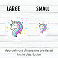 Load image into Gallery viewer, This individual die-cut sticker features a teal and purple unicorn with stars in the background. This image shows large and small Unicorn stickers next to each other.