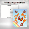 Load image into Gallery viewer, This image shows the Sending Hugs! postcard with multicolor orange butterfies in front of a rainbow.
