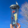 Load image into Gallery viewer, This image shows a water bottle with some of the Butterfly stickers applied.
