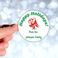 Load image into Gallery viewer, This image shows a hand holding the Personalized Holiday Stickers - Candy Cane Holidays.
