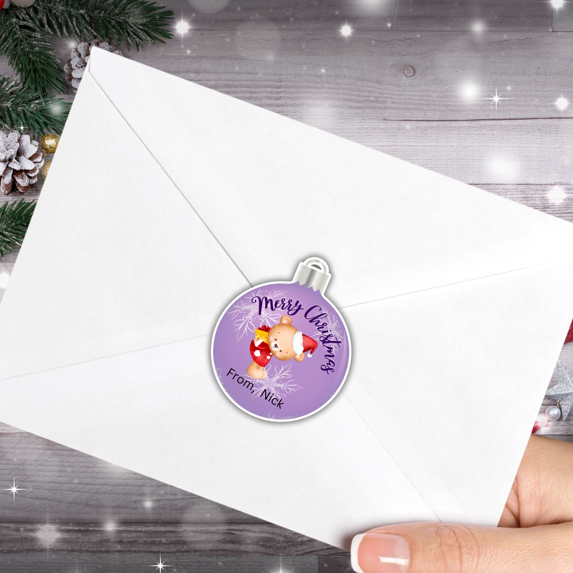 This image shows the Personalized Holiday Stickers - Christmas Ornament on the back of an envelope.