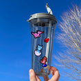 Load image into Gallery viewer, This image shows a water bottle with some of the Dragon's Lair stickers applied.
