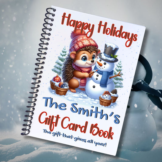 This image shows the Personalized Christmas 12 Month Gift Card Book with Stickers and PVC Cover - Porcupine & Snowman.