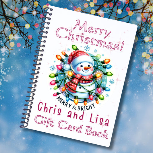 This image shows the Personalized Christmas Gift Card Book with Stickers and PVC Cover - Snowman Lights.