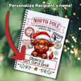 Load image into Gallery viewer, This image shows where your personalized name will be printed on the Personalized Christmas Gift Card Book with Stickers and PVC Cover - Christmas Cow.
