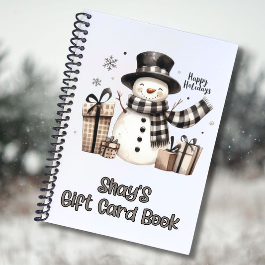 This image shows the cover of the Personalized Holiday Gift Card Book with Stickers and PVC Cover - Holiday Snowman 2.