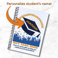 Load image into Gallery viewer, This image shows where your personalized name will be printed on the Personalized Grad Gift Card Book with Stickers and PVC Cover - Orange & Blue Celebrate.
