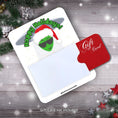 Load image into Gallery viewer, This image shows a gift card partially inside the Holiday Alien Gift Card Money Card.
