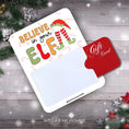 Load image into Gallery viewer, This image shows a gift card partially inside the Believe in your Elf Gift Card Money Card.
