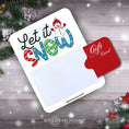 Load image into Gallery viewer, This image shows a gift card partially inside the Let it Snow Gift Card Holder Money Card.
