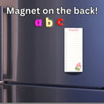 Load image into Gallery viewer, This image shows the Checklist Notepad - Gnomes on the front of a refrigerator. 
