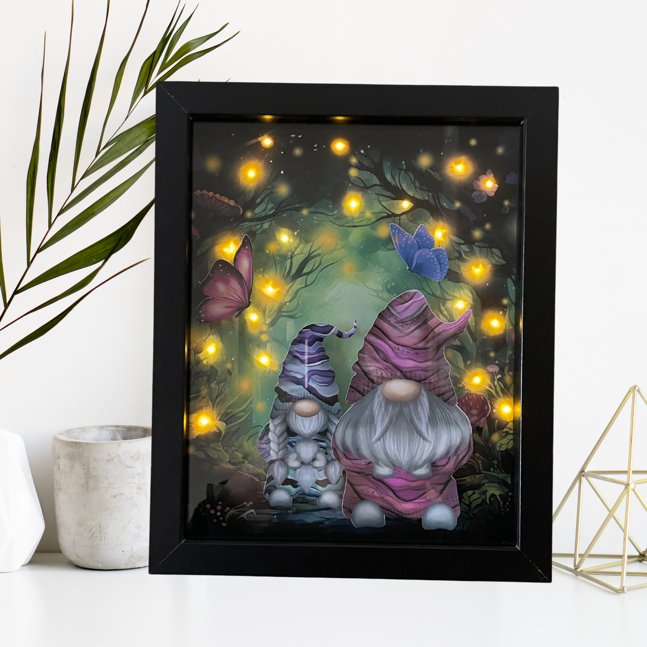 This image shows the gnomes lighted shadow box