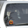 Load image into Gallery viewer, This image shows the Keep Biking - Mountain Die-Cut Sticker on the back window of a car.
