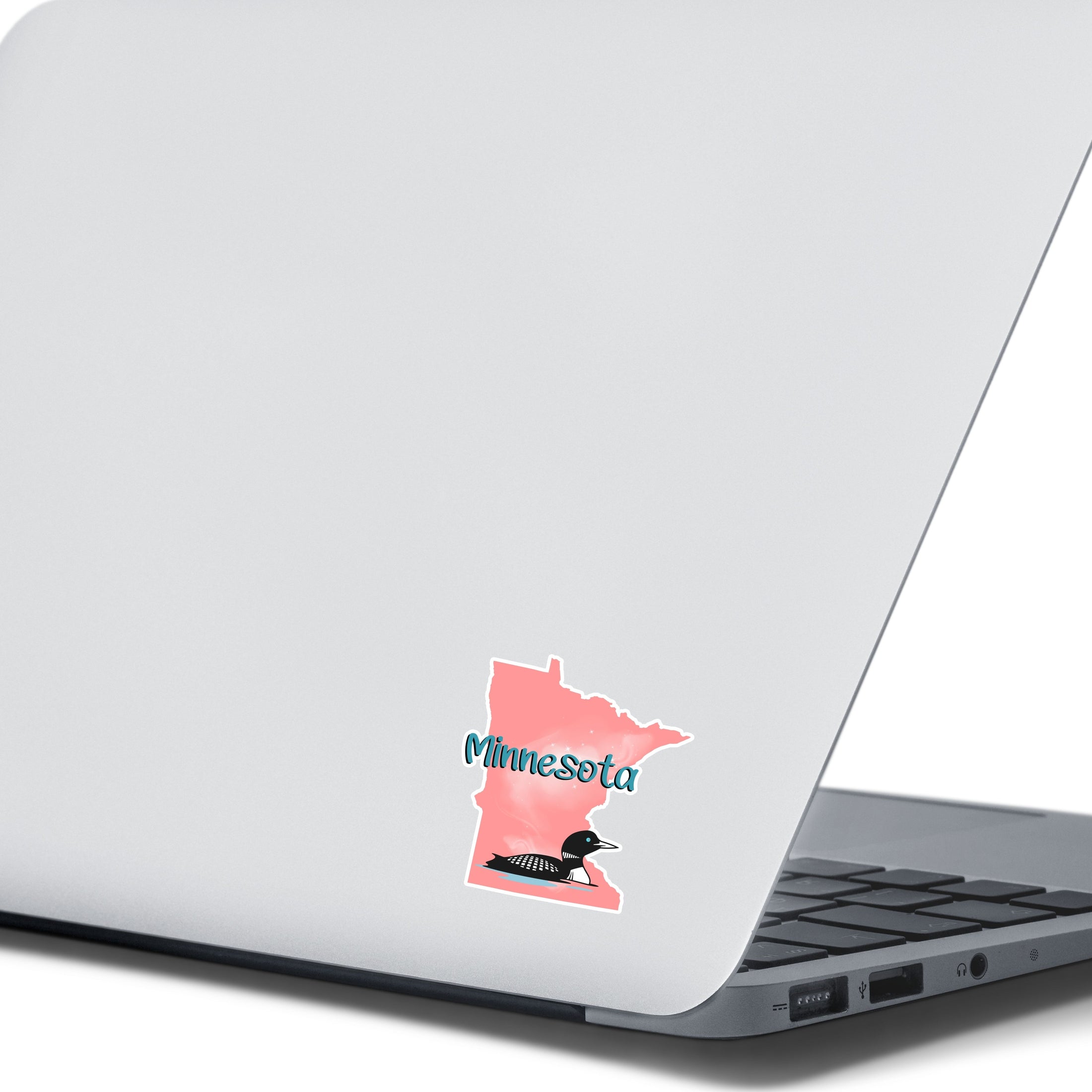 This image shows the MN with loon sticker on the back of an open laptop.