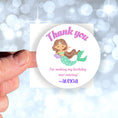 Load image into Gallery viewer, This image shows a hand holding the personalized mermaid themed thank you sticker.

