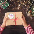 Load image into Gallery viewer, This image shows a package with the Personalized Holiday Stickers - Merry Christmas Purple on it.
