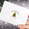 Load image into Gallery viewer, This image shows the Personalized Holiday Stickers - Merry Christmas Tree on the back of an envelope.
