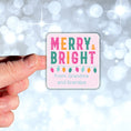 Load image into Gallery viewer, This image shows a hand holding the Personalized Holiday Stickers - Merry & Bright.
