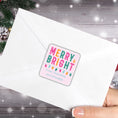 Load image into Gallery viewer, This image shows the Personalized Holiday Stickers - Merry & Bright on the back of an envelope.
