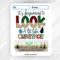 Load image into Gallery viewer, This image shows the money tube attached to the Beginning to Look a lot Like Christmas Money Card.
