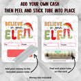 Load image into Gallery viewer, This image show how to attach the money tube to the Believe in your Elf Money Card.

