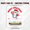 Load image into Gallery viewer, This image shows the money tube attached to the Christmas Penguin Money Card.
