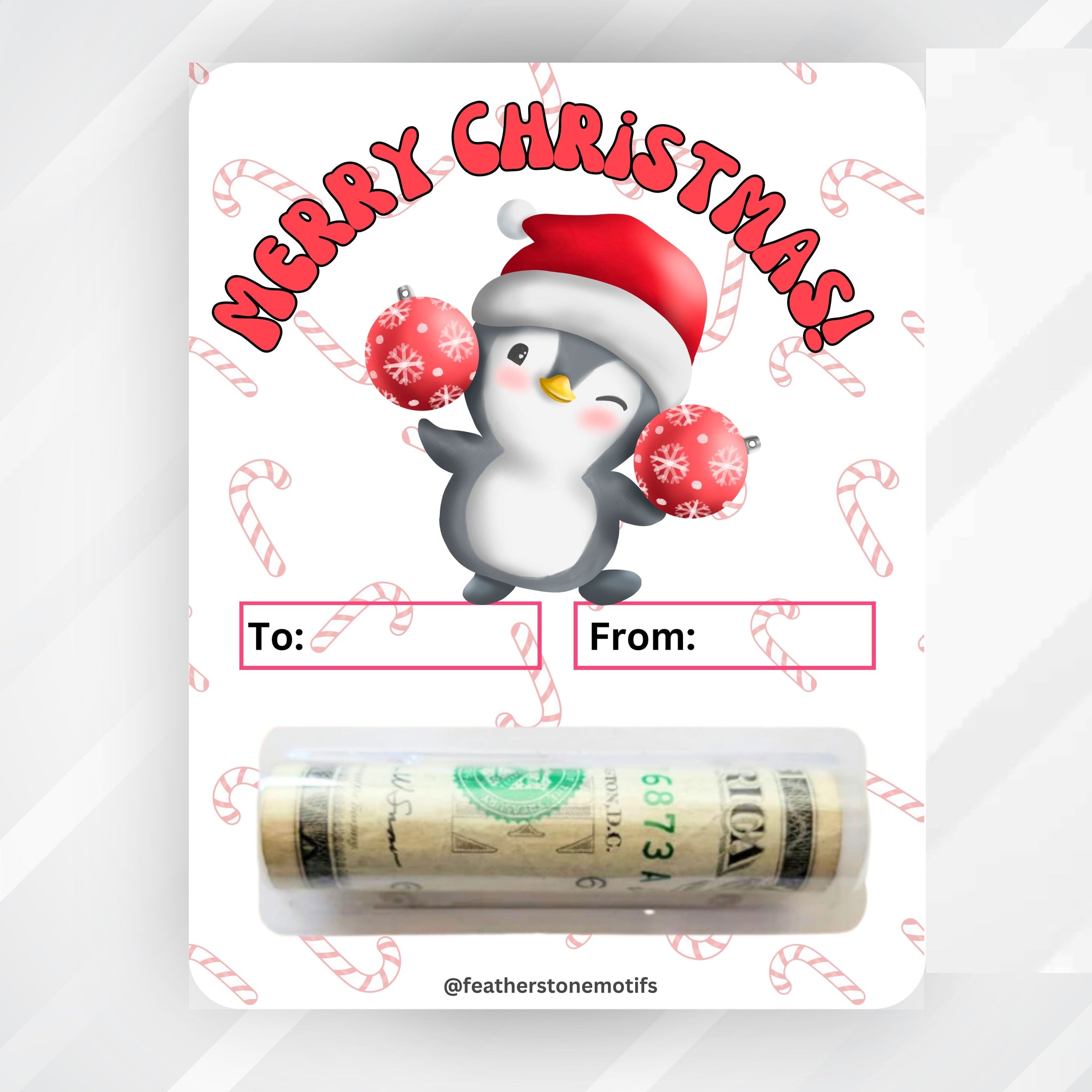 This image shows the money tube attached to the Christmas Penguin Money Card.