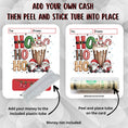 Load image into Gallery viewer, This image shows how to attach the money tube to the Ho Ho Ho Gnome Money Card.
