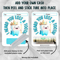 Load image into Gallery viewer, This image shows how to attach the money tube to the Lost a Tooth Money Card Kit.
