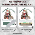 Load image into Gallery viewer, This image shows how to attach the money tube to the Santa with a Bear Money Card.
