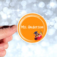 Load image into Gallery viewer, This image shows a hand holding the personalized school sticker.
