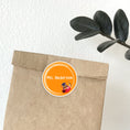 Load image into Gallery viewer, This image shows the personalized school sticker on a paper bag.

