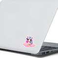 Load image into Gallery viewer, This image shows the pink chibi unicorn sticker on the back of an open laptop.
