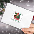 Load image into Gallery viewer, This image shows the Personalized Holiday Stickers - Plaid Christmas on the back of an envelope.
