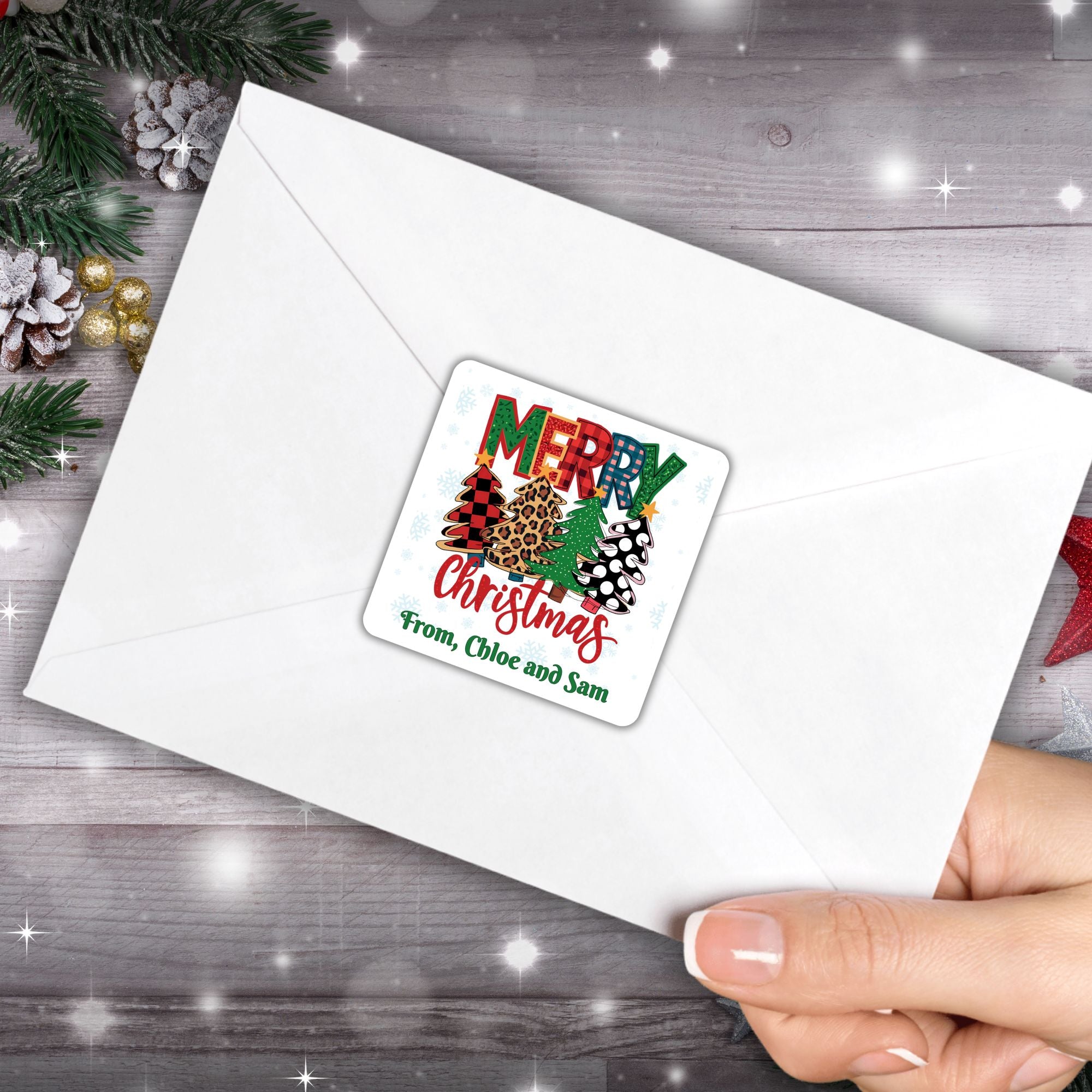 This image shows the Personalized Holiday Stickers - Plaid Christmas on the back of an envelope.