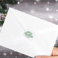 Load image into Gallery viewer, This image shows the Personalized Holiday Stickers - Sloth Merry Christmas on the back of an envelope.
