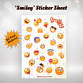 Load image into Gallery viewer, This image shows the Smiley sticker sheet with 26 vinyl stickers that is included in the Smiley themed Camp Postcard Kit.
