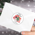 Load image into Gallery viewer, This image shows the Personalized Holiday Stickers - Snowman Christmas on the back of an envelope.
