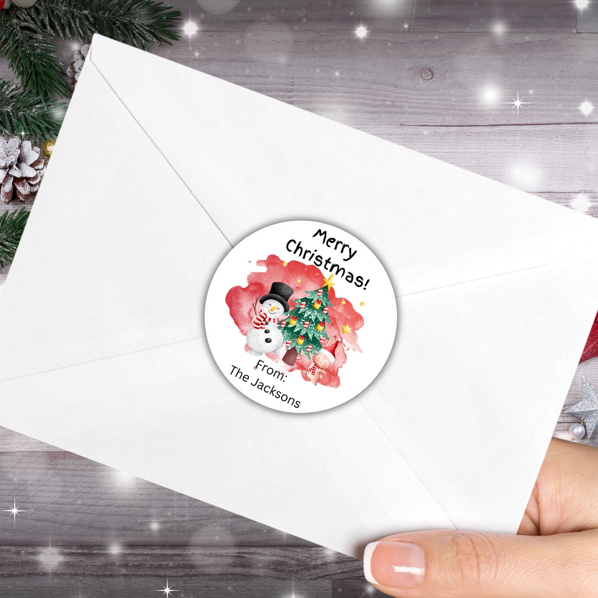 This image shows the Personalized Holiday Stickers - Snowman Christmas on the back of an envelope.