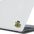 Load image into Gallery viewer, This image shows the Pirate Boy Die-Cut Sticker on the back of an open laptop.
