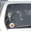 Load image into Gallery viewer, This image shows the Orange Butterfly with Stars Die-Cut Sticker on the back window of a car.
