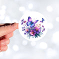 Load image into Gallery viewer, This image shows a hand holding the Purple Butterfly Die-Cut Sticker.
