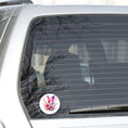 Load image into Gallery viewer, This image shows the Pink Butterfly with Stars Die-Cut Sticker on the back window of a car.
